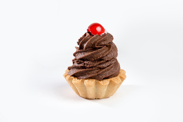 Small chocolate cupcake with with cherry on top.