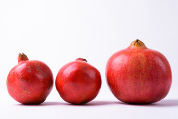 Portrait Of Three Pomegranates In A Row