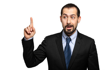 Young businessman having the solution isolated on white