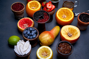 Close-up view of Eastern hookah smoking ingredients . Shisha concept. Modern hookah.