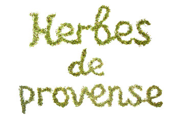 Inscription in french provence herbs on a white isolated background. Flat lay. Made from provence herbs.