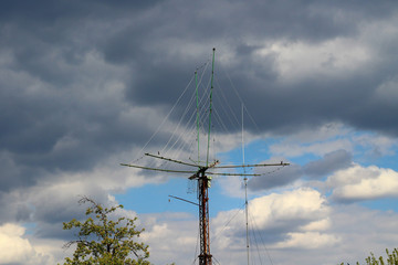 Radio communication antennas of different frequencies against the sky