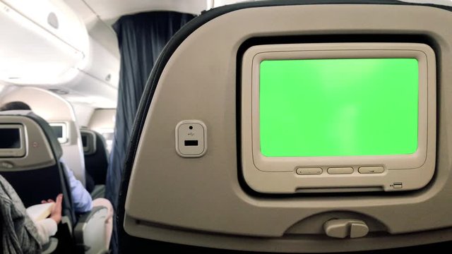 Monitor Green Screen on Passenger Seat of an Airplane. You can replace green screen with the footage or picture you want. You can do it with “Keying” effect in After Effects.