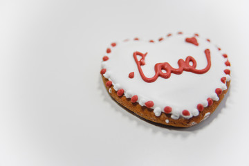 Closer look at the ginger cookie with sugar layer and word Love