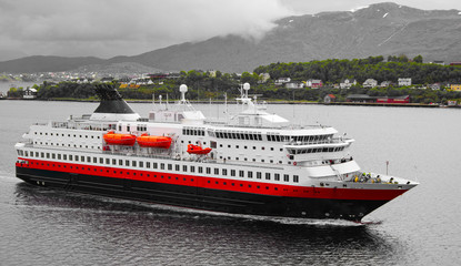 Famous Norwegian Hurtigruten on classic post ship or cruiseship or cruise ship liner MS Nordnorge...