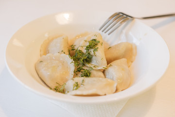 delicious dumplings with herbs and coffee