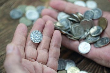 lucky coin in the palm of your hand