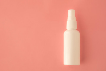 Sanitizing antibacterial spray in white bottle for infection prevention concept. Sanitizer to prevent