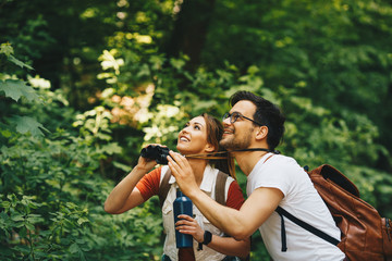 Young people hiking and exploring nature.