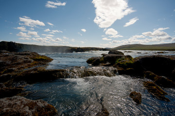 volcanic landscape water and sky