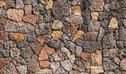 Wild stone wall texture background.