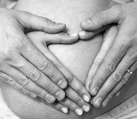 hands of pregnant woman. Love photo. Heart. Hands.
