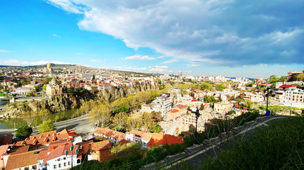 Fototapeta na wymiar TBILISI, GEORGIA APRIL 19, 2020: Beautiful aerial view of the old part of city in Tbilisi, Georgia