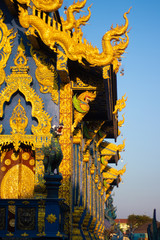 A beautiful view of Wat Rong Suea Ten, the Blue Temple at Chiang Rai, Thailand.
