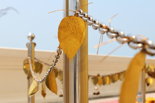 Golden prayer leafs at a buddhist temple