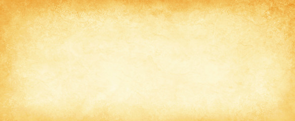 old yellow gold parchment paper background with dark yellowed vintage grunge texture borders and off white light center in distressed faded antique colors