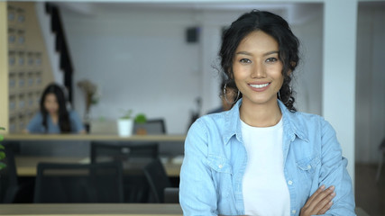 Business concept. A woman standing confidently in the office. 4k Resolution.