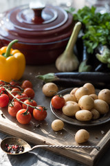 Vegetable Ingredients for Home Cooking. Young Potatoes, Cherry Tomatoes and Herbs