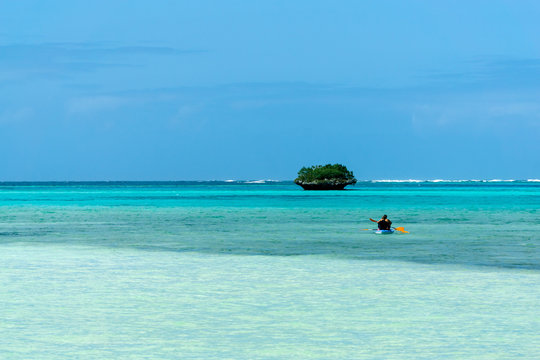 Tropical Beach With Palm Trees And Araucaria. Isle Of Pines  New Caledonia. Turquoise Water