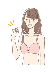 ガッツポーズする女性