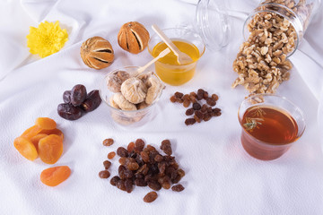 various dried fruits, apricot, nuts, faygi, dates and raisins