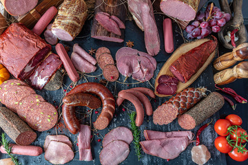 Smoked meat products. Display meats, cold cuts and sausages in a butcher's shop.