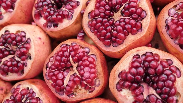 Sliced pomegranate fruits at the bazaar of Turkey.