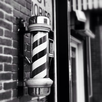 Close-up Of Barber Sign Outside Barber Shop Stock Photo | Adobe Stock