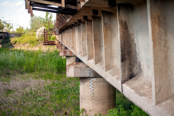 abandoned railway bridge. bridge requiring repair. bridge over the river