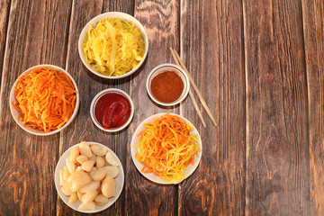 Korean side dishes, carrots, cabbage, kimchi and various kinds of vegetables, a set of fermented products, the concept of a detox diet, healthy and natural food, selective focus