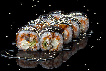 stuffed sushi on a dark background © Olexandr Tytarchuk