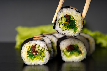 stuffed sushi on a dark background