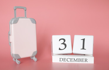 Calendar wooden cube. December 31, time for a winter holiday or travel, vacation calendar