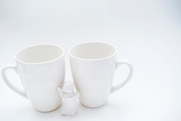 White circles with a pattern on a light background with a angel