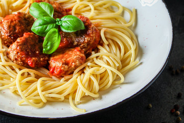 pasta spaghetti with meatballs and tomato sauce Menu concept healthy eating. food background top view copy space for text