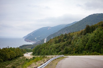 Cape Breton highway winding along the Atlantic ocean shore.