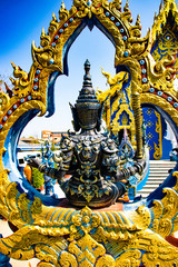 A beautiful view of Wat Rong Suea Ten, the Blue Temple at Chiang Rai, Thailand.