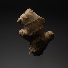 ginger root on black background