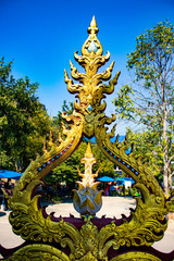 Fototapeta premium A beautiful view of Wat Rong Suea Ten, the Blue Temple at Chiang Rai, Thailand.