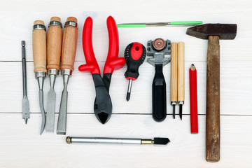 Set of tools on a wooden background.Tools for different work. Instrument for wood and metal work.
