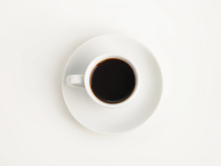 White cup of Dominican Republic.coffee. Top view.
