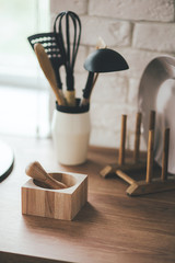 
cooking utensils on a baking table
