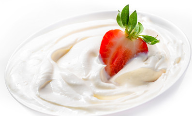 Strawberries with whipped cream. Dessert