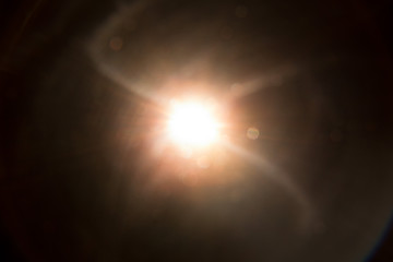 Abstract Natural Sun flare on the black background.