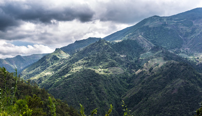 dramatic image of agricultural fields and farms high in the Caribbean mountains of the Dominican republic.