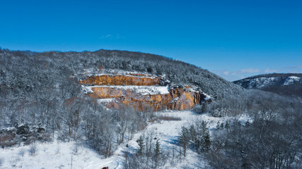 Snow Covered Tree Top on Hill (Drone Photo)