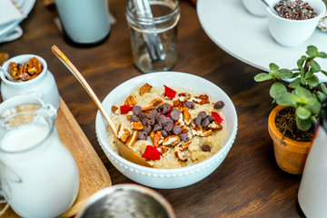 Healthy breakfast with cereal, oatmeal, with coconut, chocolate