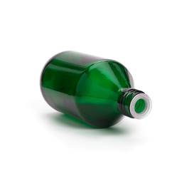 Medical green bottles for medicine in cosmetology on a white background