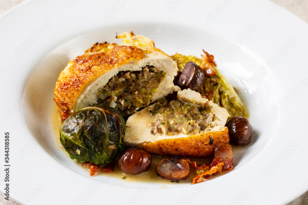 Wall mural roast chicken with savoy cabbage and chestnuts