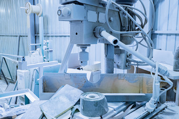 Drilling machine in the dust. Old drilling machine. Drilling machine in the workshop. Metalworking. Electrical equipment for Metalworking.